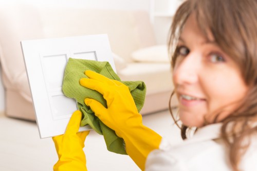 Satisfied homeowner after gutter cleaning by Leah Cleaning Maids